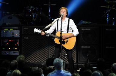 Former Beatle Paul McCartney performs at the Change Begins Within Concert, Saturday April 4, 2009 in New York. (AP Photo/Stephen Chernin)
